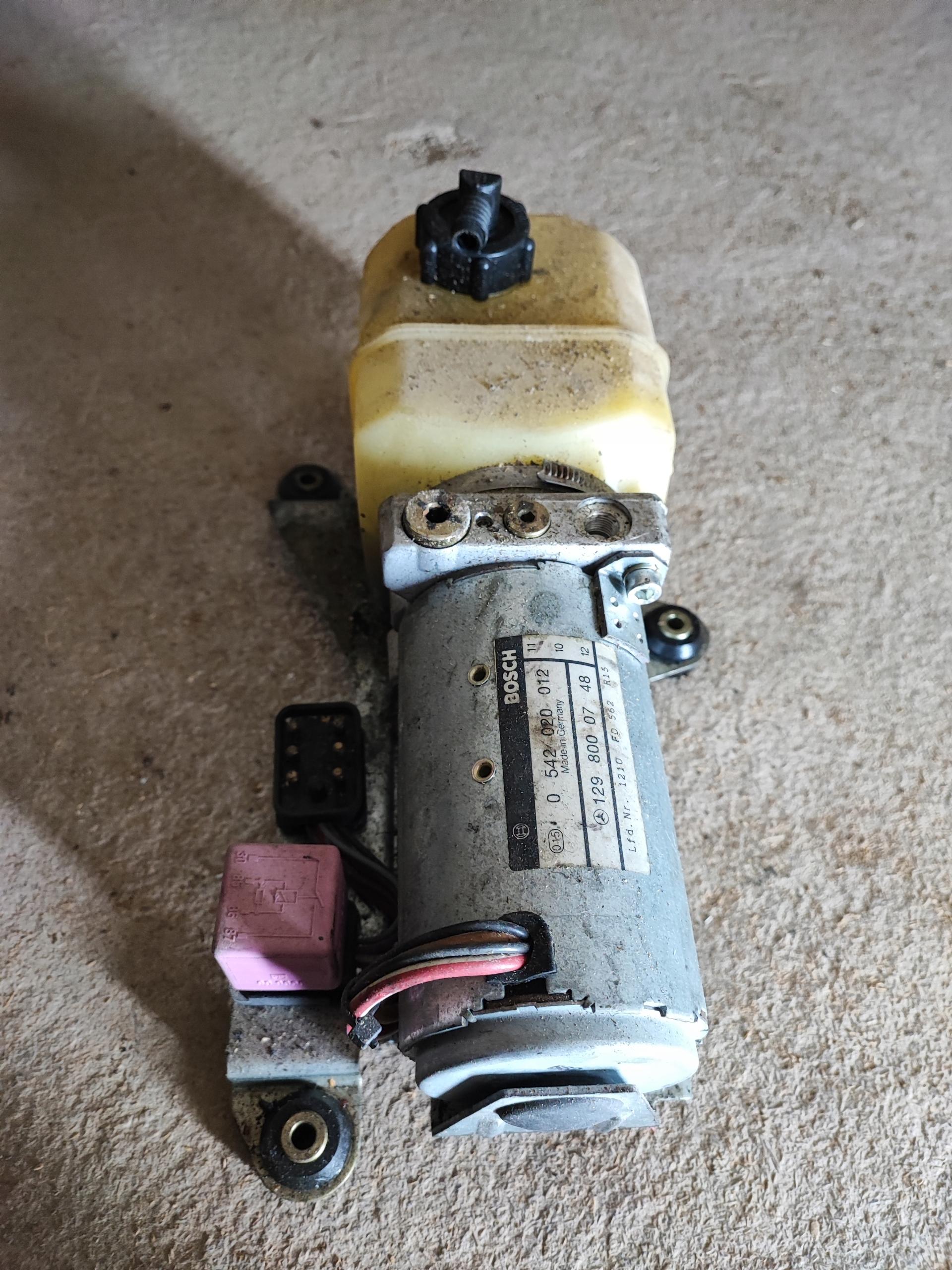 1298000748 гидравлический насос крыши R129