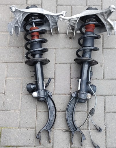 Audi q5 аморс -поглинач 8f0413029 активний