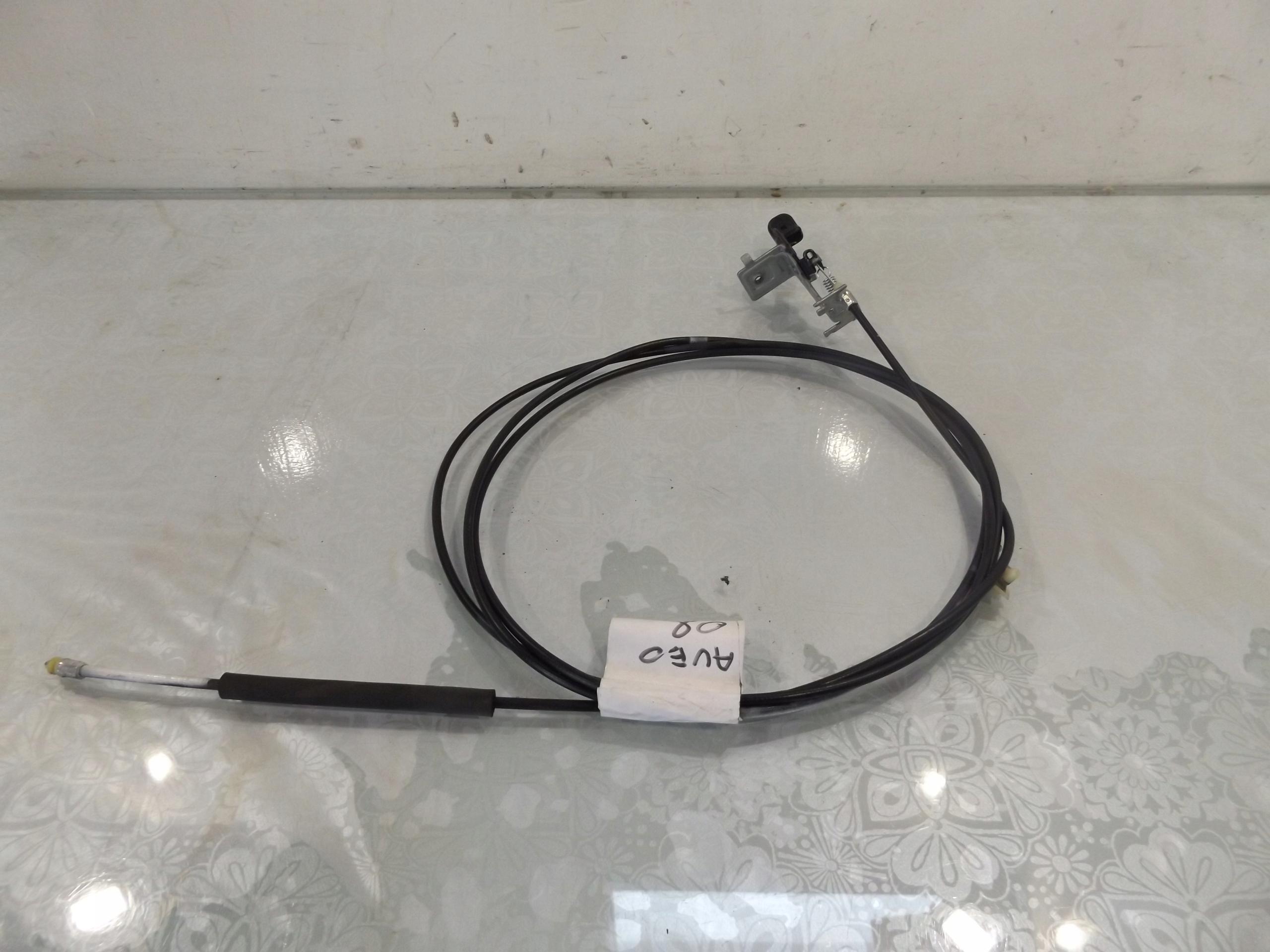 AVEO T250 трос крышки топливного бака