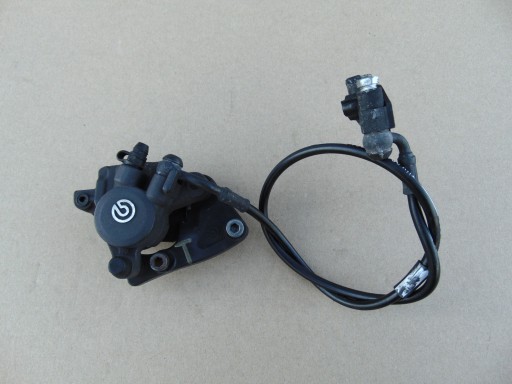 BMW F 650CS ТОРМОЗНОЙ СУППОРТ ЗАДНИЙ ТРОС