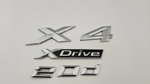 51148737320 - BMW X4 G02 2019-2023 XDRIVE 20d ЭМБЛЕМА ЗАДНЯЯ 8737320