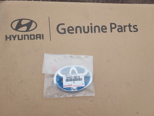 75403-48010 - ЭМБЛЕМА ЗАДНЕЙ ДВЕРИ TOYOTA CAMRY/PRIUS 7540348010