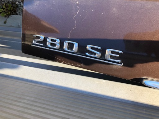 1268170215 - ЕМБЛЕМА НА ЗАДНЮ ДВЕРІ MERCEDES W126 280SE