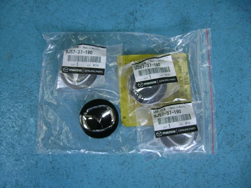 12345 - ЭМБЛЕМА ЛОГОТИП КРЫШКА СТУПИЦЫ ГУБКИ MAZDA ДИСКИ