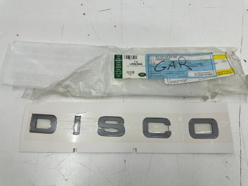 LR063644 - ЭМБЛЕМА ЛОГОТИП ИНСТРУКЦИЯ НА ЗАДНЕЙ ДВЕРИ БАГАЖНИКА LAND RANGE ROVER DISCO