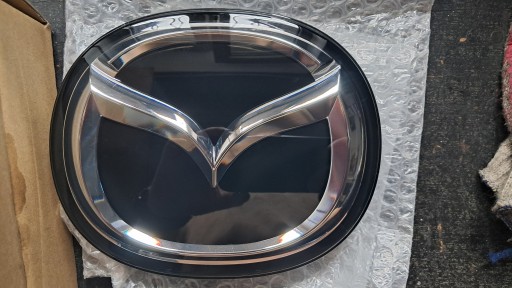 GSH7-51-730 - ЕМБЛЕМА РАДАРА ЛОГОТИП MAZDA 6 GL 2018-2022 NEW OE