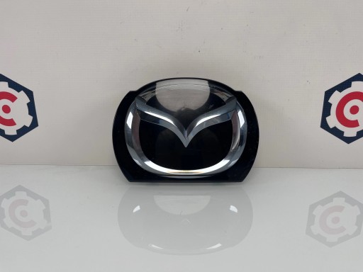 B45F-51731 - ЕМБЛЕМА НА РАДАР MAZDA 3 BM