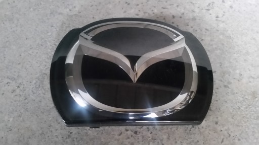 B45F 51731 - ЭМБЛЕМА С СЕТКОЙ А ПОД РАДАРОМ ДЛЯ MAZDA 3 BM BN ORIGINAL B45F-51731