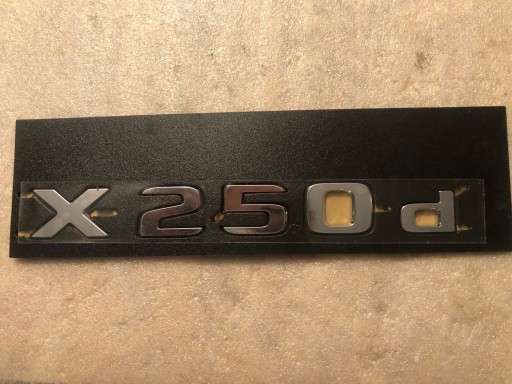 Эмблема монограмма X250d Mercedes Original New A4708171800