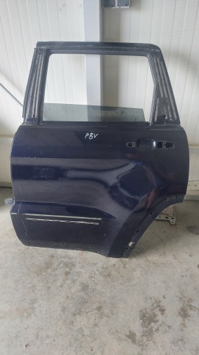 Grand cherokee wk2 11-20r двері лівий задній pbv