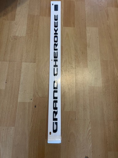 GRAND CHEROKEE wl 4xe 21-24 ЕМБЛЕМА ДВЕРЕЙ ЛІТЕРА 68571723AA