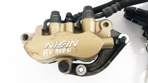 09iuhbnm - HONDA VARADERO 1000 передній гальмівний супорт