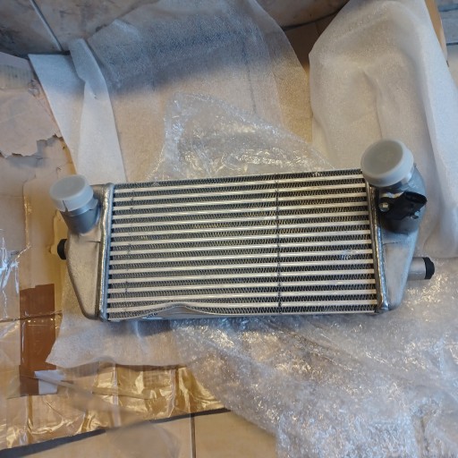 28190-4X900 - РАДИАТОР ИНТЕРКУЛЕР KIA CARNIVAL III 2.9 OE