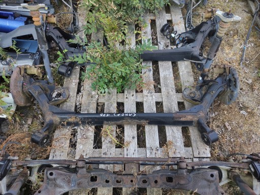 Kia carens iv подвесная балка задняя ось 2014 года.