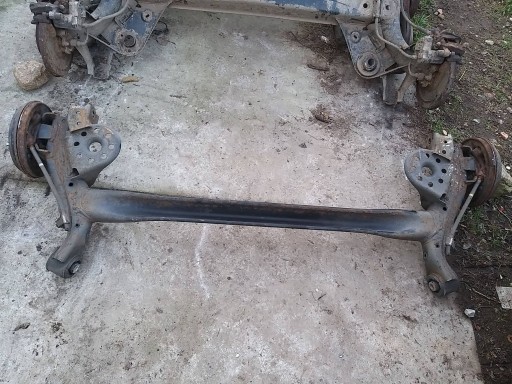 NNI7554 - Kia rio v 17- axis задній промінь задня підвіска барабана