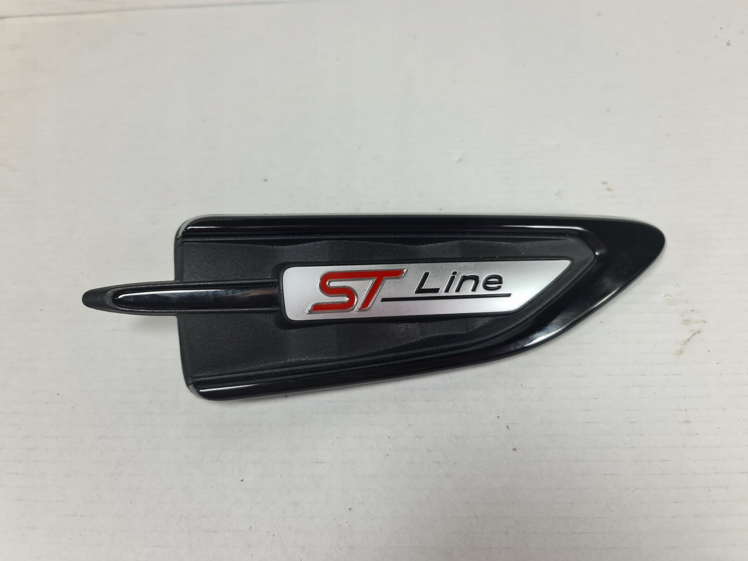 GJ54-16C216-CA - KUGA MK2 ST ЗНАЧОК ЕМБЛЕМА КРИЛА ПРАВИЙ ЧОРНИЙ