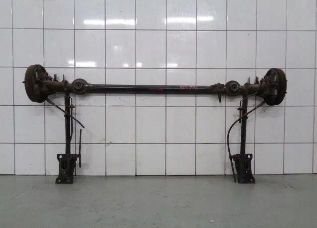 Kia Rio 04 1.3 B Балка ось подвески задний левый