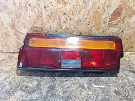 Ліхтар задній лівий nissan sunny coupe b12 90-92 iki4435