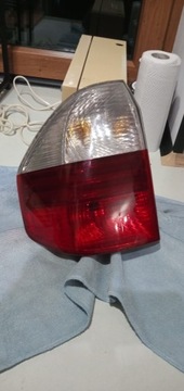 Задняя лампа влево BMW E83 x3 Polift