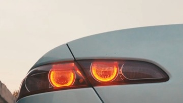 Alfa Romeo 159 задні світильники - кільця з мотивом індикатора напрямку