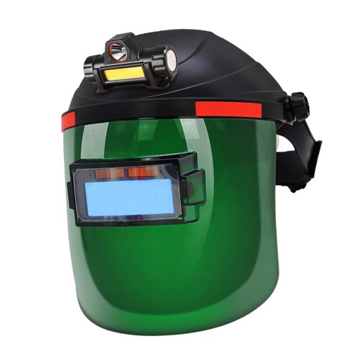 Большой вид сварщика, шлифовка сварного шва, сварка