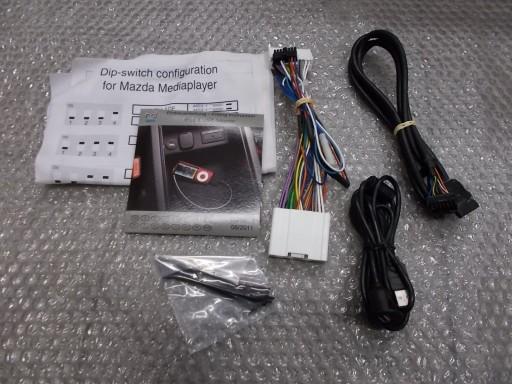 MAZDA 2 6 адаптер РОЗ'ЄМ IPOD новий! Оригінал!