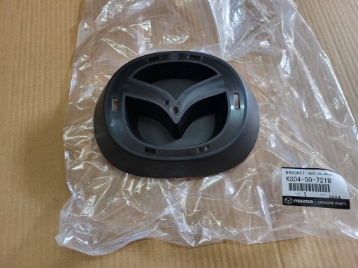 KS04-50-721B - MAZDA CX-5 CX 5 II 2 LIFT 22r ОСНОВАНИЕ ЭМБЛЕМЫ ПЕРЕДНЕГО GRL