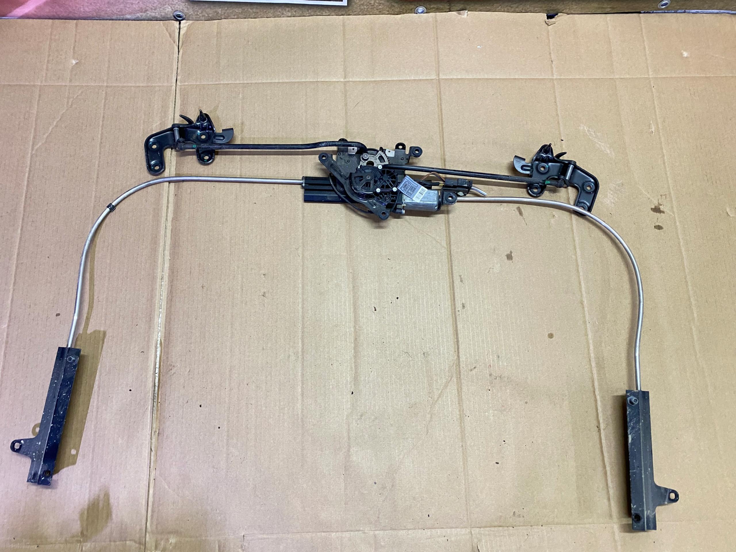 Механизм откидывания крыши BMW E93