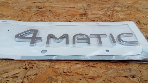 MERCEDES EQC W293 19- ЕМБЛЕМА ЗАДНІХ ВОРОТ БЕЙДЖ 4MATIC A2938170300