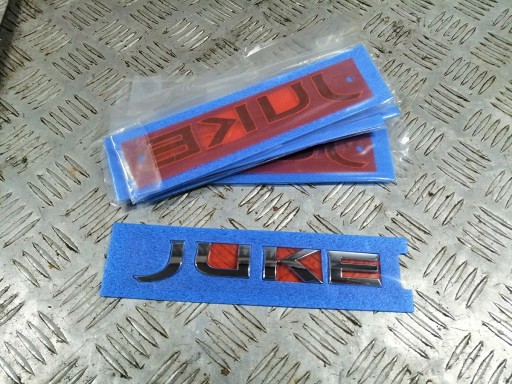 908921ka0a - NISSAN JUKE 2016 ЭМБЛЕМА JUKE НАДПИСЬ НА ЗАДНЕМ БАМПЕРЕ