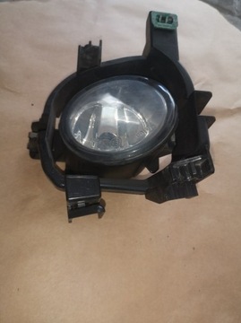 Navara D23 галогенная левая с рамкой