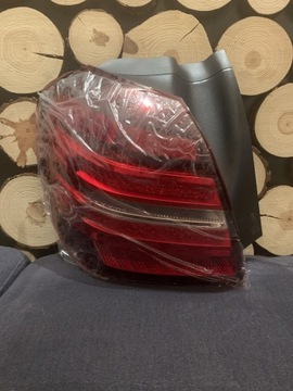 Нова оригінальна ліва задня лампа