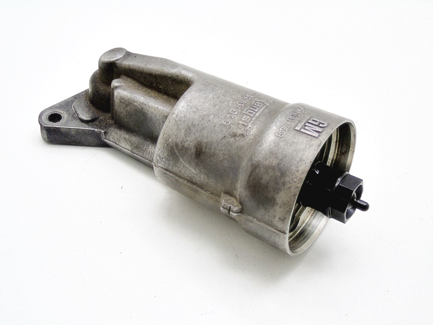 55560748 - КОРПУС МАСЛЯНОГО ФИЛЬТРА 1.2 16V CORSA C D ASTRA AGILA