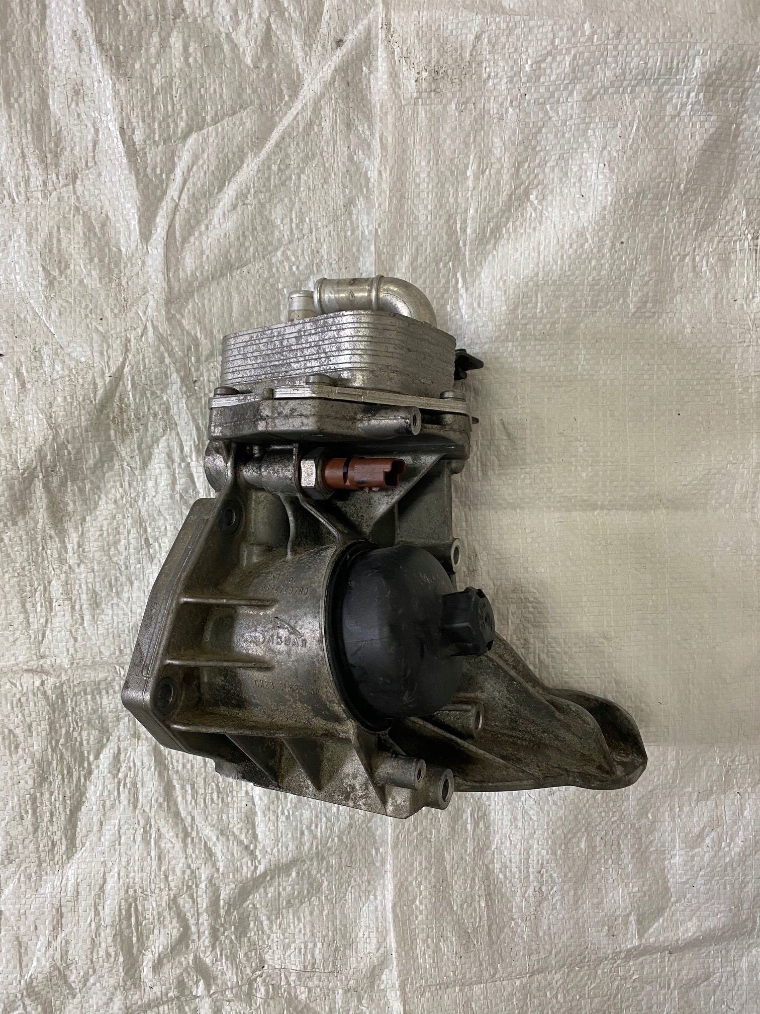 Корпус масляного фильтра JAGUAR XF 2.2 D CX23-6L625-AA