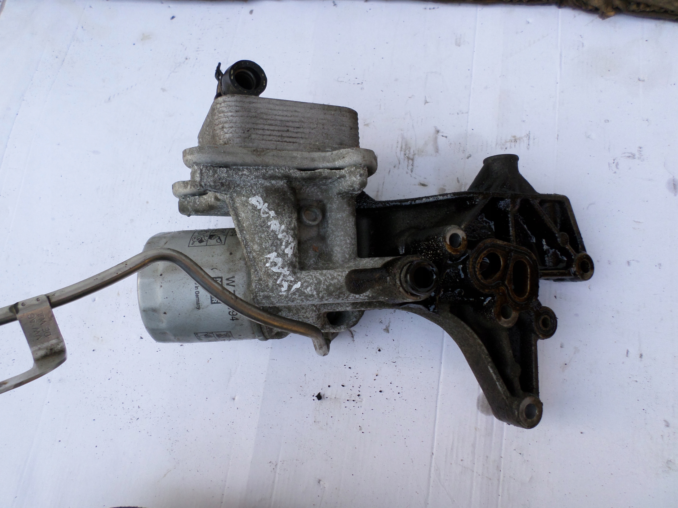 03F117021A - ОСНОВАНИЕ МАСЛЯНОГО ФИЛЬТРА SKODA SEAT AUDI 1.2 TSI