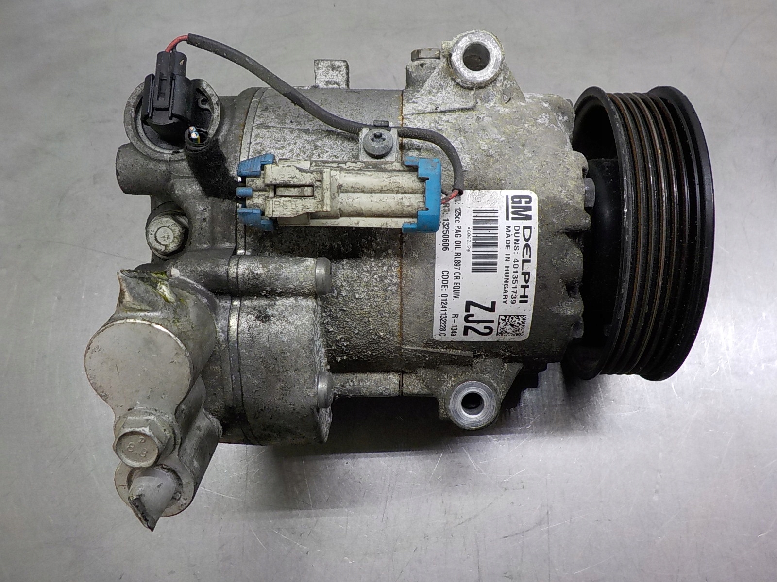 КОМПРЕССОР КОНДИЦИОНЕРА OPEL ASTRA J 13250606 ZJ2