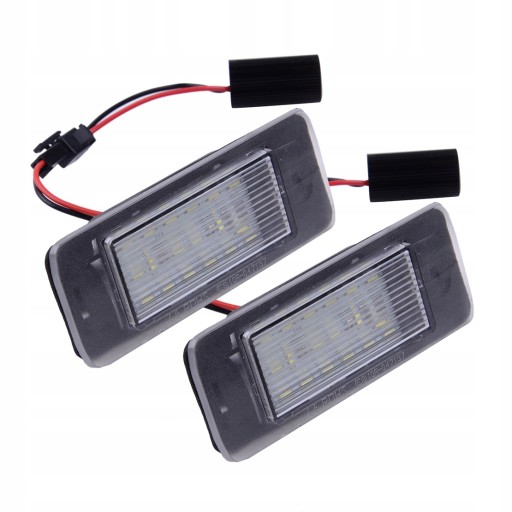 XXCA10373 - Подсветка номерного знака на Opel Astra J.