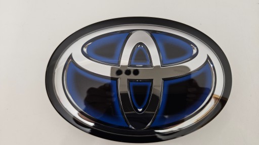 TOYOTA COROLLA E-21 2018-2023 ГИБРИД ПОД РАДАРОМ ПЕРЕДНЯЯ ЭМБЛЕМА 90975-02124