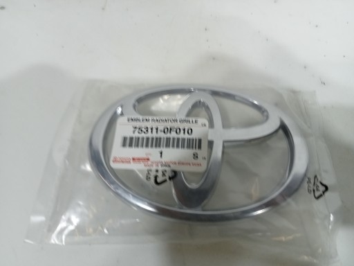 TQ-026 БЕЙДЖ ЕМБЛЕМА ПЕРЕДНИЙ ВІНОЧОК VERSO 04-07 75311-0F010