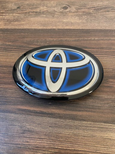Emblemat_CorollaE21 - Toyota Corolla E21 XII Hybrid Емблема Оригінал 90975-02136