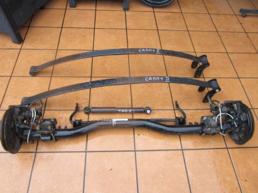 2K5511151D 1K0407152BG - Vw caddy 2k5 задня вісь підйомника без подвійної пружини