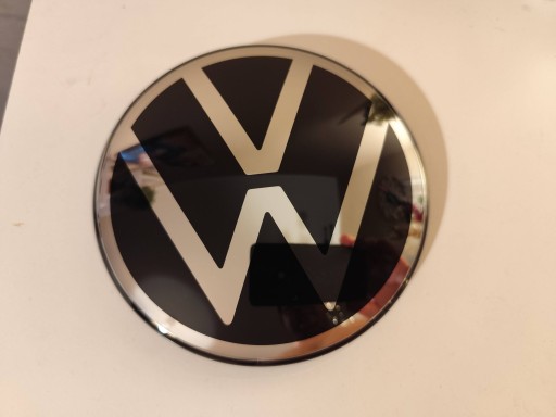 2GM853601E - VW T-Roc Polo VI T-Cross Touran III Эмблема Значок Передняя часть под радаром NewOe