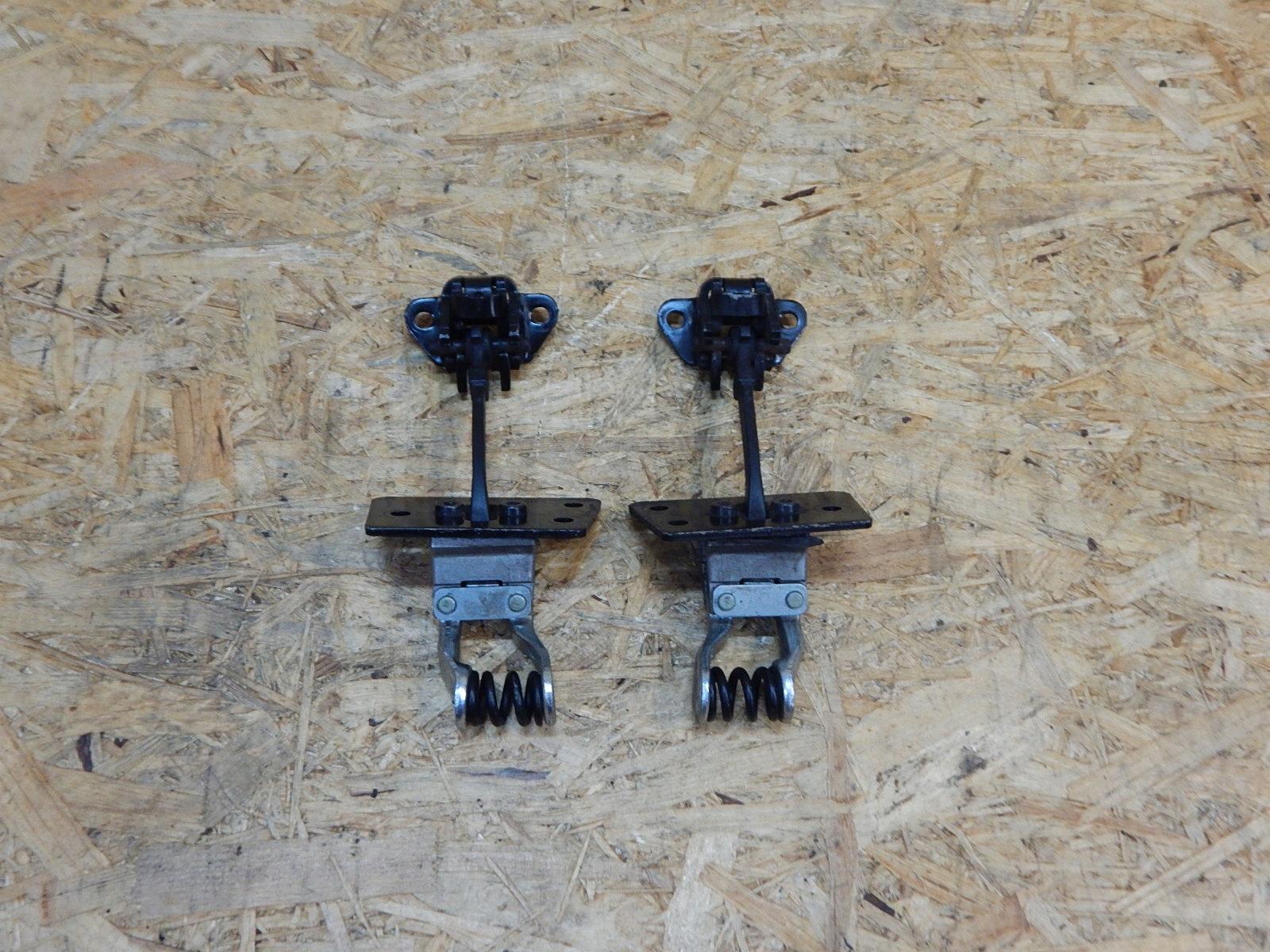 7H0827793E 7H0827794E - VW T5 ограничитель двери крыла правый левый