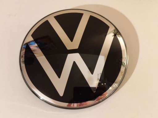 760853601E - VW Touareg III 760 18- Эмблема Передняя часть под радаром, новый оригинал