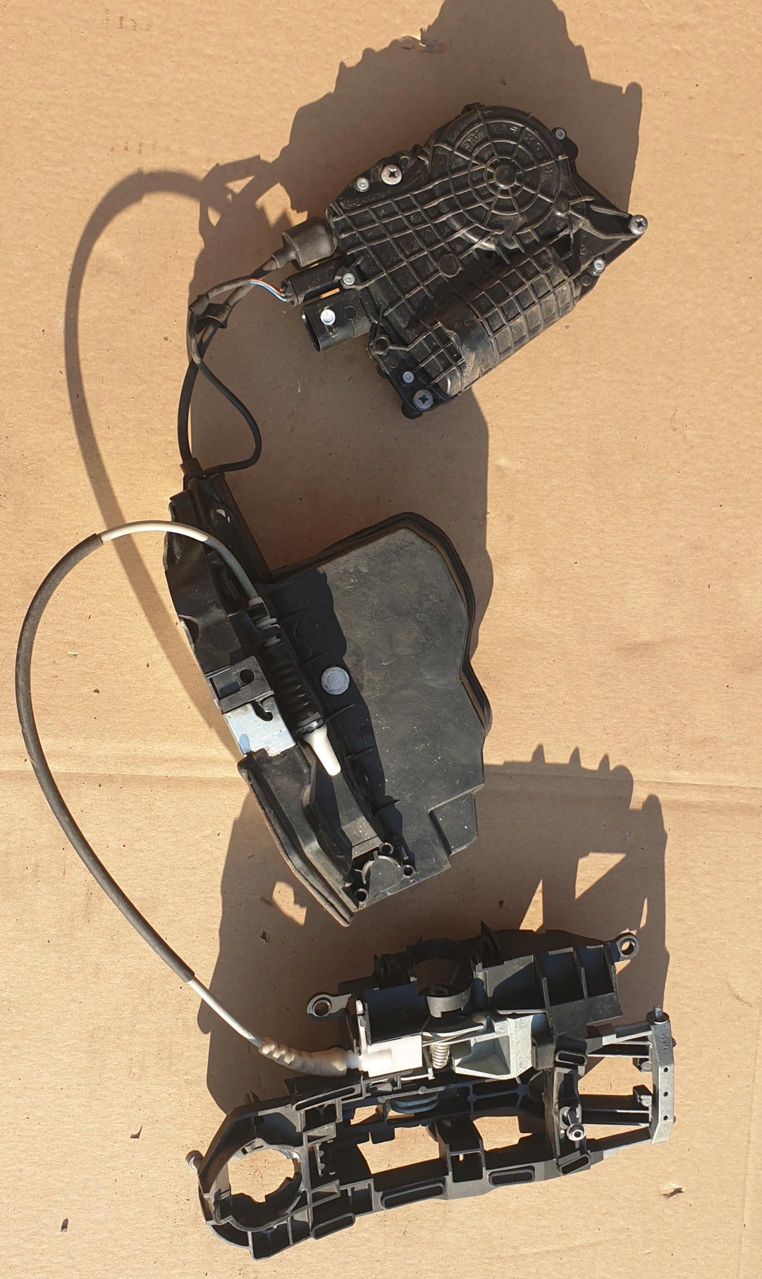 Замок двері зд лівий тяга BMW 7 F01 F02 7185687