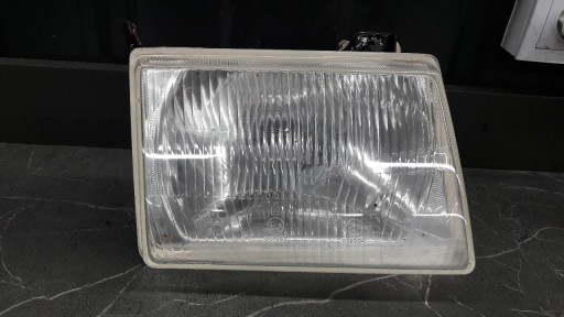 Kinby 0020042 права фара ford escort mk3