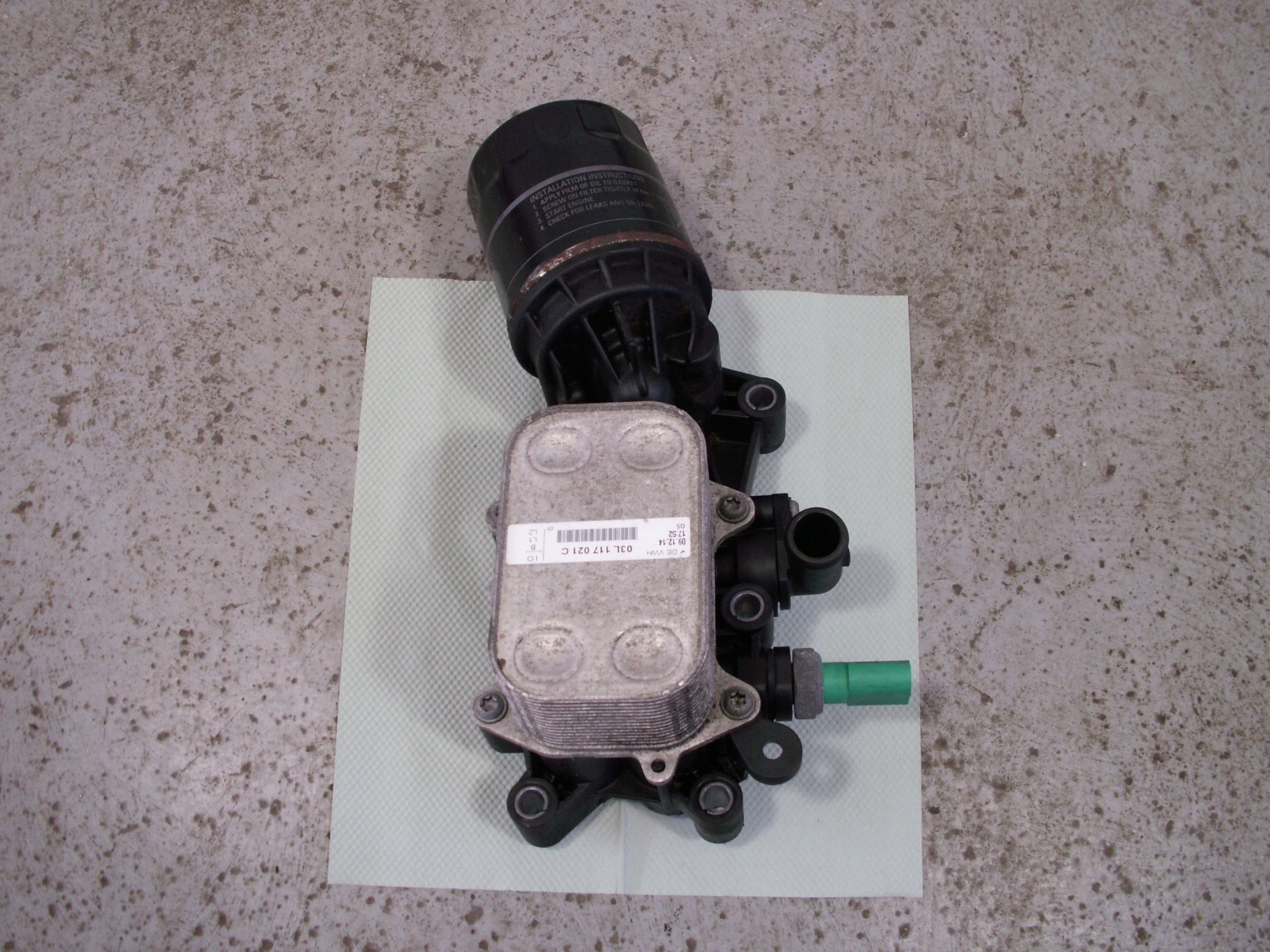 04B115389B 03L117021C - основание масляного фильтра радиатор FABIA III 1.4 TDI